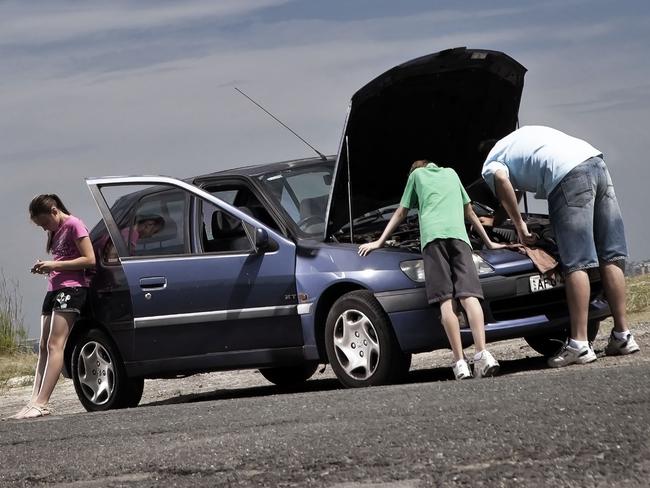 Generic image of a car broken down during a family road trip on summer holidays.