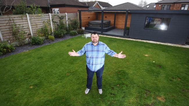 Jody Wainright, 41, spent $37,000 creating a secret bunker bar in his back garden. Picture: Caters