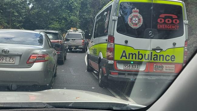 An ambulance heads up the Kuranda Range Road to treat two patient involved in a single vehicle rollover. . Picture: Susan Miano