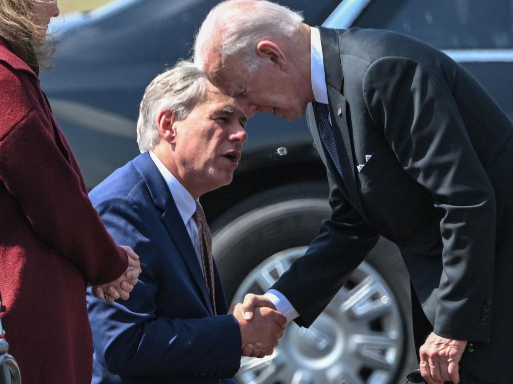 Biden greets Texas Governor Greg Abbott at Garner Field Airport in Uvalde, Texas on May 29, 2022. Picture: Mandel Ngan / AFP.