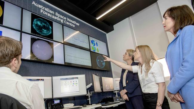 Dr Kate Brand shows MP Tanya Plibersek and SA Deputy Premier Susan Close the Bureau of Meteorology's Australian Space Weather Forecasting Centre. Picture: NCA NewsWire / Naomi Jellicoe