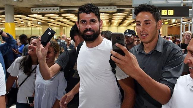 Diego Costa arrives in Madrid.