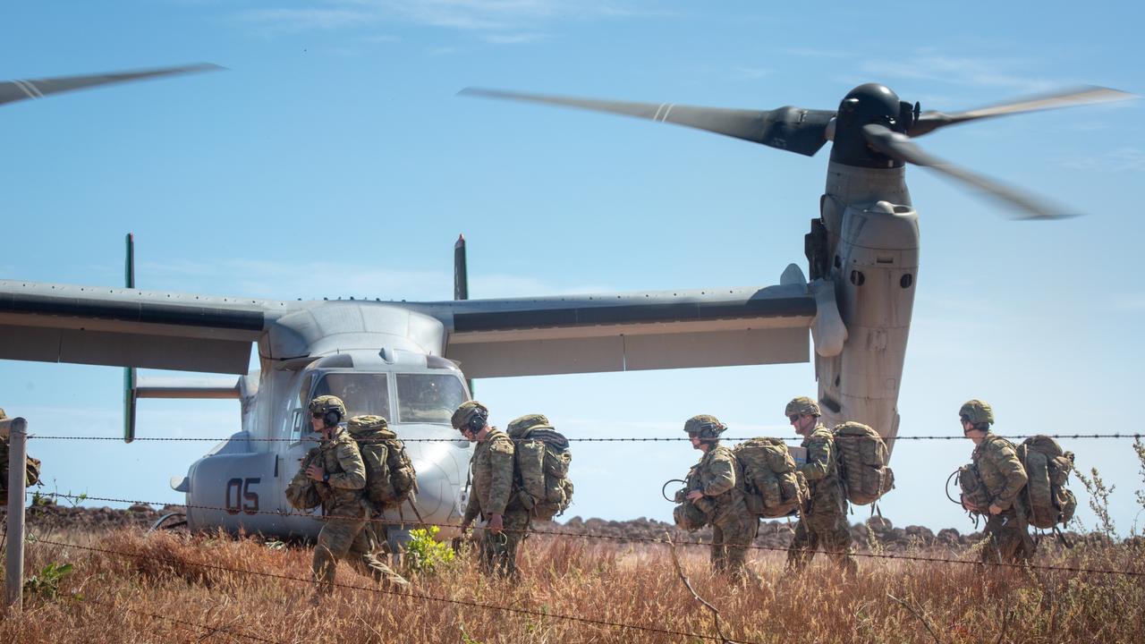 Australian Army soldiers carry their gear off a landing zone during exercise Crocodile Response at Point Fawcett, NT, last year. Picture: Defence