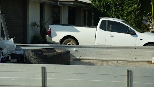 Two gunman are on the run after storming a home on the Gold Coast overnight and witnesses say they opened fire on one of the residents inside.