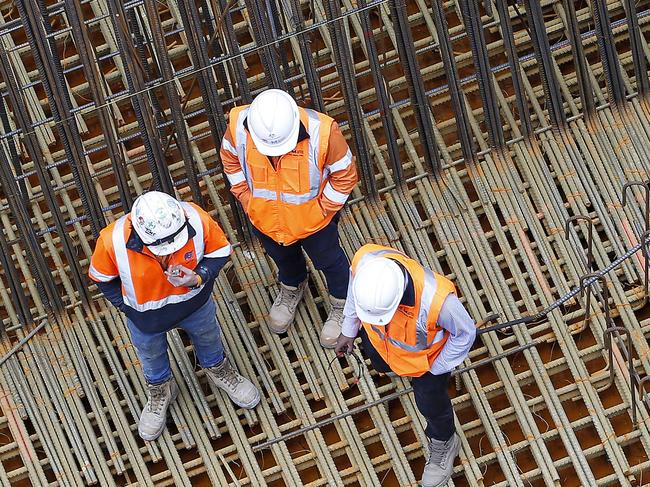 SYDNEY, AUSTRALIA - NewsWire Photos JUNE 12 , 2024: Workmen on the construction site of the New Bradfield Station.  Prime Minister, Anthony Albanese, with the Premier of New South Wales, Chris Minns, and Federal Minister for Infrstructure Catherine King, Deputy Premier Prue Car, NSW Transport Minister Jo Haylen, NSW  Minister for planning and Public spaces Paul Scully and the Member for Werriwa, Anne Stanley visit the construction site of the new Bradfield station in the Western Sydney Aerotropolis.  Picture: NewsWire / John Appleyard