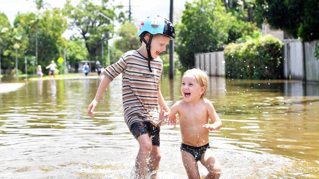 Ernest Ave and Hilton Tce, Tewantin, remains closed as residents prepare for more rain and heavy flooding to hit the Sunshine Coast. Kai and Marley McAviney. Picture: Patrick Woods.