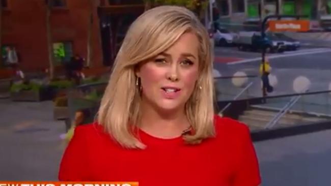 Sam Armytage in red after swapping outfits.