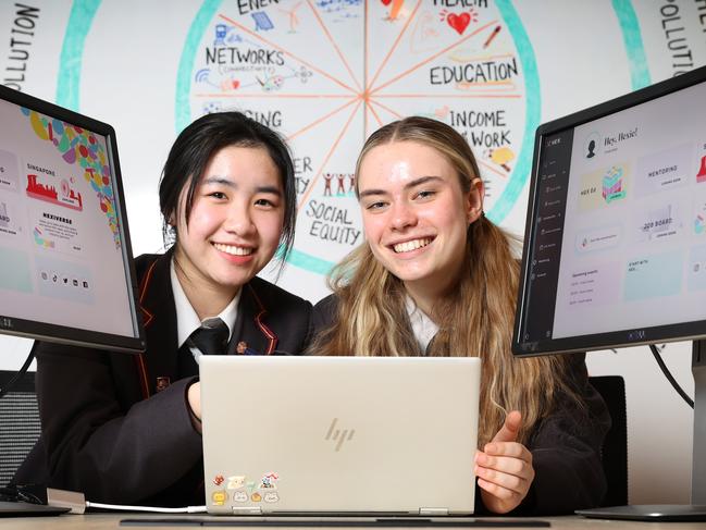 Private schools promoting entrepreneurial programs and partnering with tech companies to boost the skills of their students. Students Abigail Nguyen 15 and Sienna Lauber 16 working on their entrepreneurial skills at the RMIT University.                     Picture: David Caird