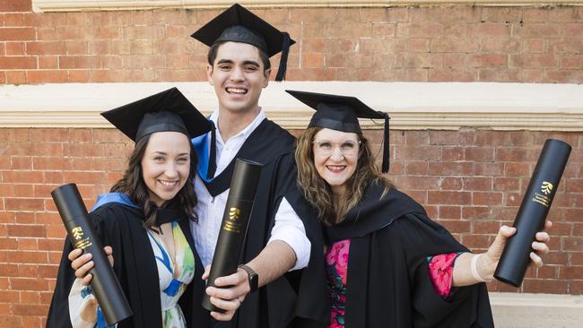 Bachelor of Nursing graduates Louise McDonald (right) with her daughter Sophie Edser and son-in-law Ryley Edser at the UniSQ graduation ceremony at Empire Theatre. Picture: Kevin Farmer