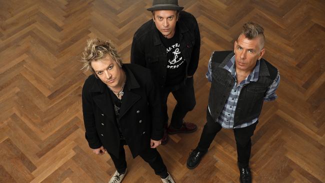 The Living End: Chris Cheney, left, Andy Strachan and Scott Owen. Picture: Chris Pavlich.