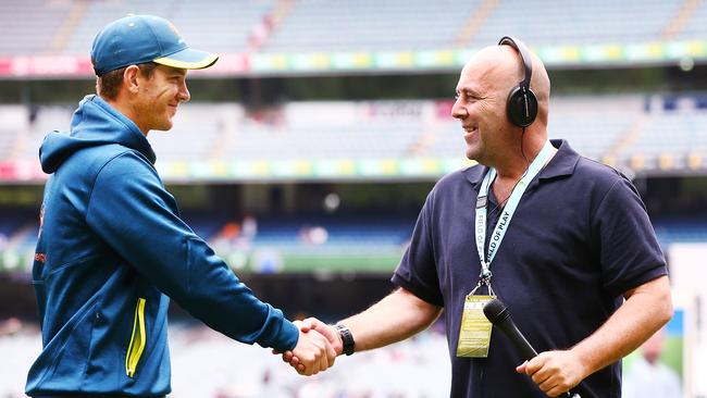 MELBOURNE, AUSTRALIA - DECEMBER 30: A defeated Captain Tim Paine of Australia (L) shakes the hand of former Australian Cricket head coach Darren Lehmann during day five of the Third Test match in the series between Australia and India at Melbourne Cricket Ground on December 30, 2018 in Melbourne, Australia. (Photo by Michael Dodge/Getty Images)