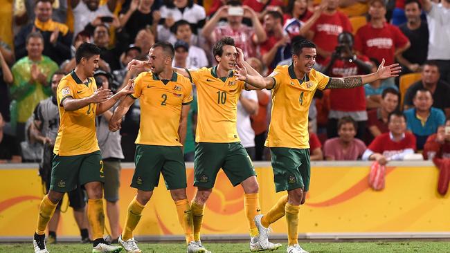 BRISBANE, AUSTRALIA - JANUARY 22: Tim Cahill of Australia celebrates with team mates his second goal during the 2015 Asian Cup match between China PR and the Australian Socceroos at Suncorp Stadium on January 22, 2015 in Brisbane, Australia. (Photo by Matt Roberts/Getty Images)