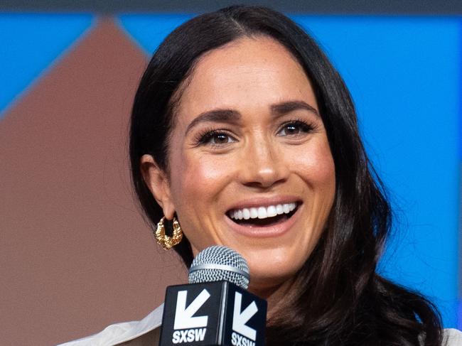 (FILES) Britain's Meghan, Duchess of Sussex, attends the "Keynote: Breaking Barriers, Shaping Narratives: How Women Lead On and Off the Screen," during the SXSW 2024 Conference and Festivals at the Austin Convention Center on March 8, 2024, in Austin, Texas. Meghan Markle, the wife of Britain's Prince Harry, is launching a new lifestyle brand seemingly named after the couple's oceanside California home. An Instagram page and website for American Riviera Orchard went live without advance warning March 14, both featuring a gold-colored crest for the new venture. (Photo by SUZANNE CORDEIRO / AFP)