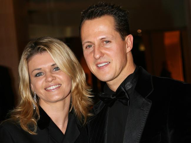 MONTE CARLO, MONACO - DECEMBER 08:  Michael Schumacher of Germany, seven time Formula One World Champion, and wife Corinna attend the 2006 FIA Gala Prize Giving Ceremony held at the Salle des Etoiles Sporting Club on December 8, 2006 in Monte Carlo, Monaco.  (Photo by FIA via Getty Images)