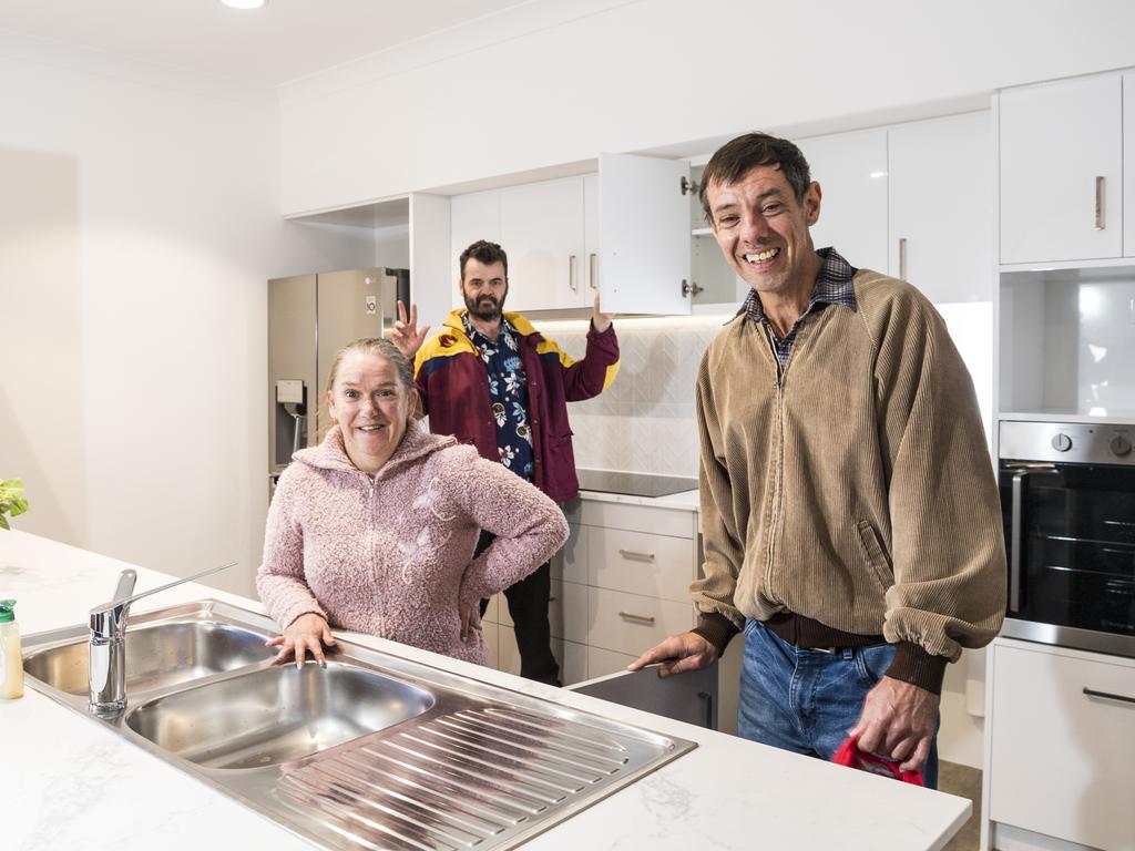 Annamaree Maguire, Scott Craig and Scott McNalty (right) check out their future home, part of the My Home, My Life accessible homes initiative of the Endeavour Foundation. Picture: Kevin Farmer