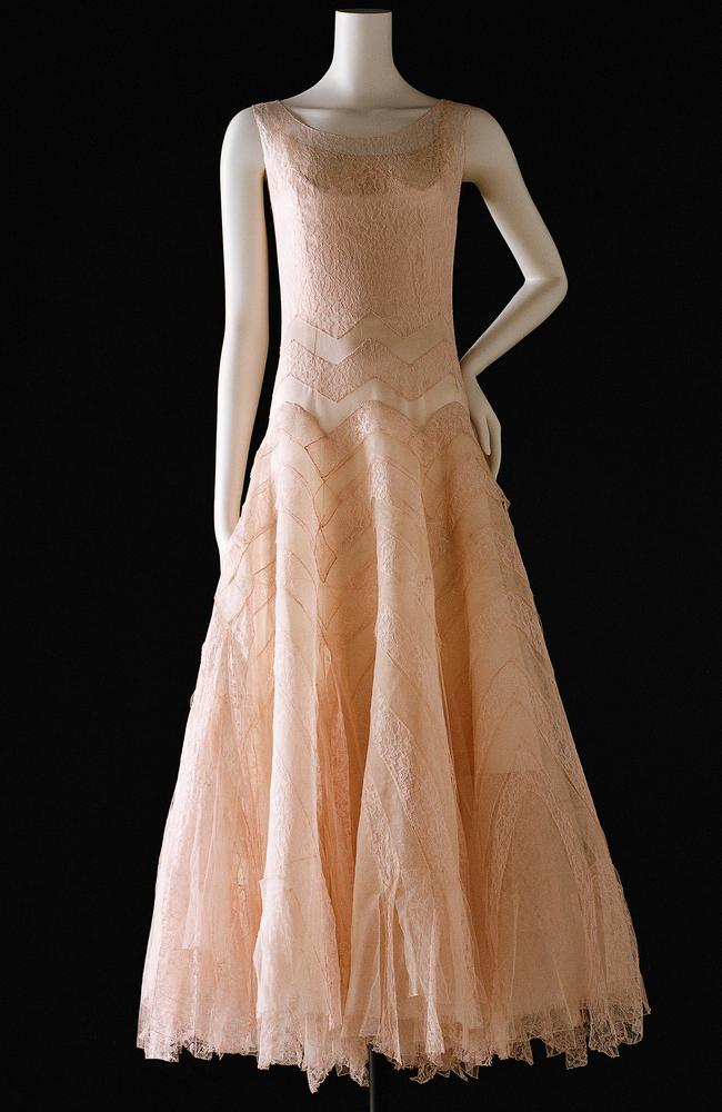 A stunning Chanel 1920s silk crepe evening dress with tulle and embroidered with gold thread.