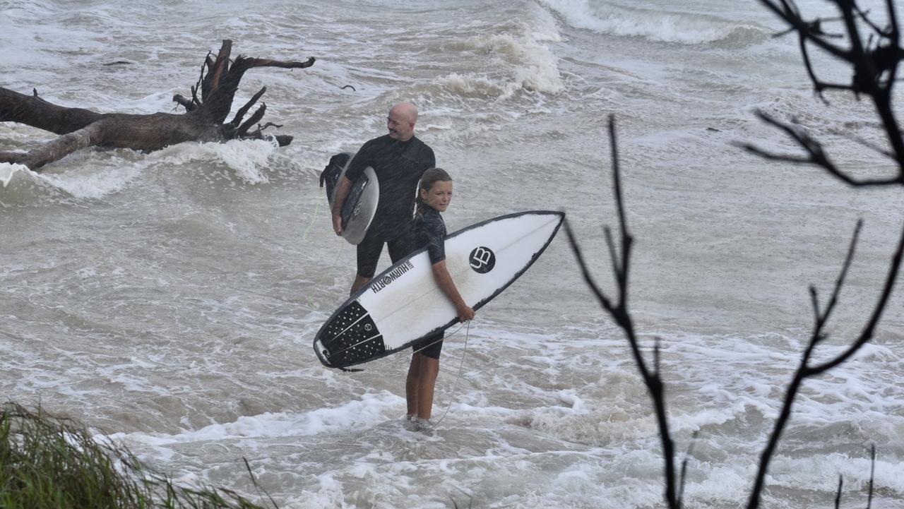 The weather wasn't as rainy as previus days, so many beach fanatics decided to check out the swell from the dunes or to get in the water at Clarkes Beach on Tuesday.