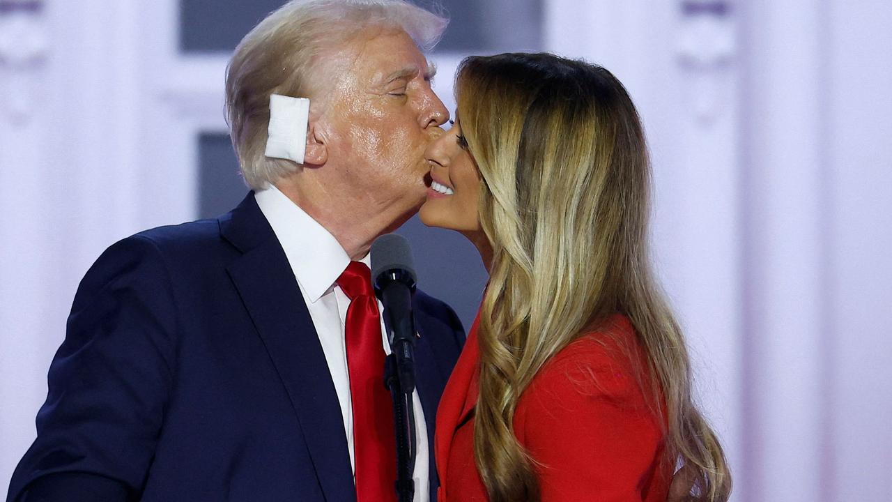 Mr Trump kisses Mrs Trump on stage at the Republican convention. Picture: Chip Somodevilla/Getty Images via AFP