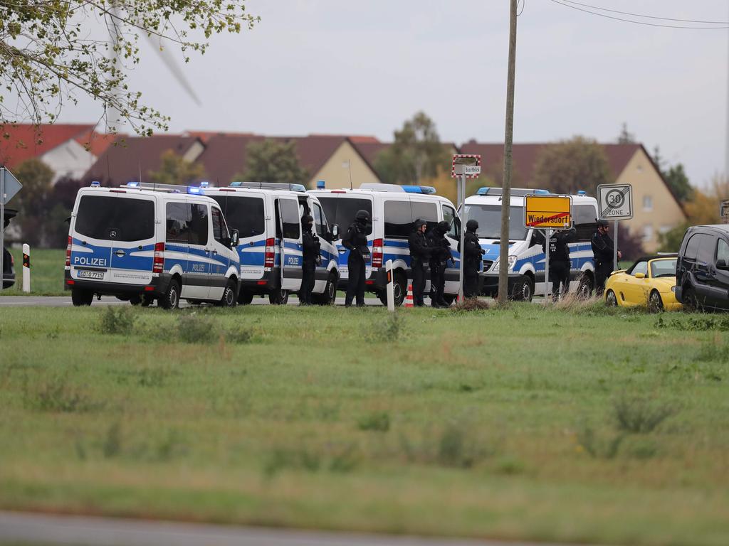 Policemen secure the area between Wiedersdorf and Landsberg where shots were fired. Picture: AFP