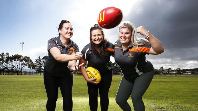 Players from the South East Suns women's football club Emma Bygrave, Lucy Featherstone and Makayla Bruce are excited to be getting new change rooms at Pembroke Park in Sorell. Picture: Zak Simmonds