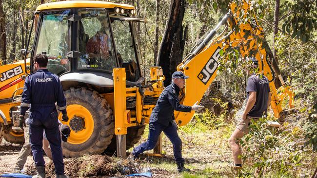 Police search the rugged terrain north of Dargo for the bodies of Ms Clay and Mr Hill. Picture: Jason Edwards