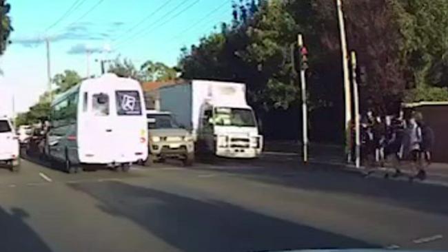 Dashcam footage showing the moment before the Marryatville students are hit by a truck running a red light on Kensington Rd on March 22, 2023. Picture: 7NEWS