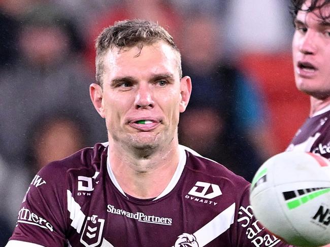 BRISBANE, AUSTRALIA - MAY 09: Tom Trbojevic of the Sea Eagles passes the ball during the round ten NRL match between the Dolphins and the Manly Sea Eagles at Kayo Stadium, on May 09, 2024, in Brisbane, Australia. (Photo by Bradley Kanaris/Getty Images)