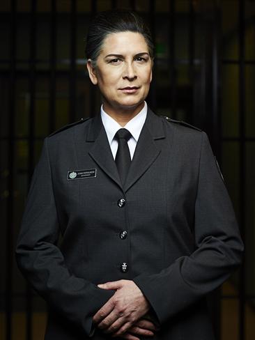 Pamela Rabe as Joan “The Freak” Ferguson.