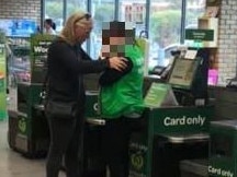 Woolies employee pictured crying. Picture: Facebook