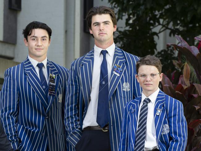 Nudgee College is advocating for  COVID-19 state border restrictions exemptions ahead of September school holidays. Dean of Boarding Christian Oneto with year 12 student Elton Schibble (from Hunter Valley), year 11 student Frank Bundock from Warialda and year 7 student Hunter Warby from Gravesend. Thursday August 20, 2020. Picture: Renae Droop