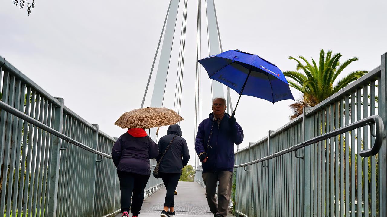 And the dreary weather. Picture: NCA NewsWire / Luis Enrique Ascui