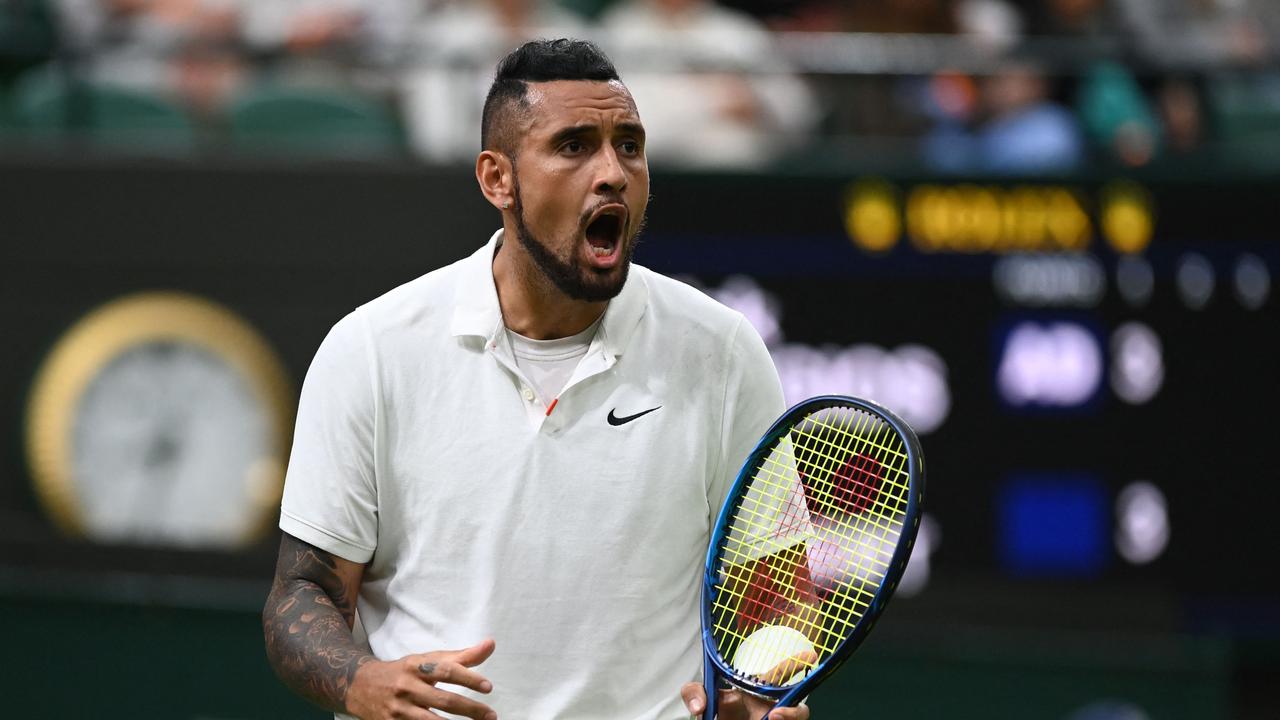 Australia's Nick Kyrgios celebrates breaking France's Ugo Humbert during their men's singles first round match on the second day of the 2021 Wimbledon Championships at The All England Tennis Club in Wimbledon, southwest London, on June 29, 2021. (Photo by Glyn KIRK / AFP) / RESTRICTED TO EDITORIAL USE