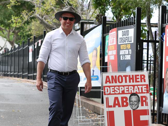 Premier Steven Miles visits the polling booth at New Farm State School with Grace Grace this morning. Picture: Adam Head