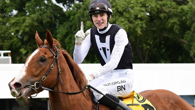 Baylee Nothdurft celebrates another winner after steering The Acutary to victory at Doomben. Picture: Trackside Photography