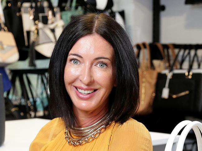 Colette Hayman with her range of designer handbags at the Colette by Colette Hayman HQ. The global fashion brand has it's HQ in Brookvale on Sydney's Northern Beaches. Picture: Troy Snook.