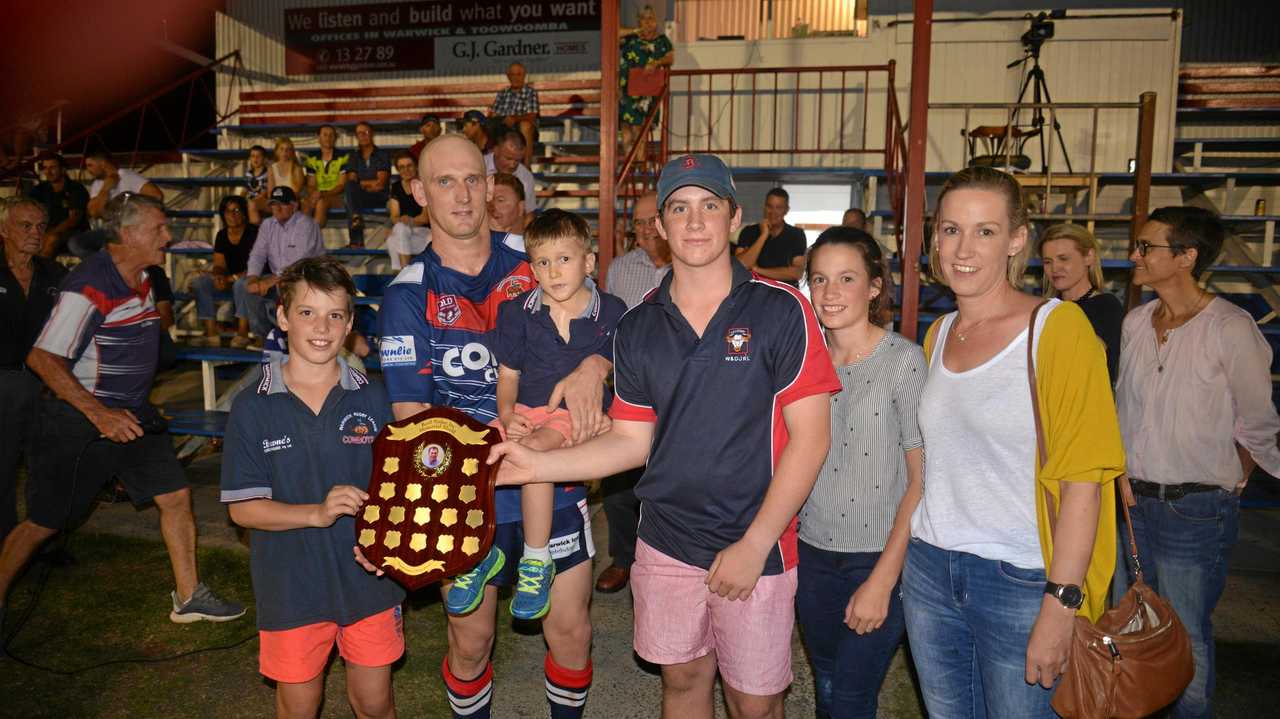 The presentation of the Basil Nolan Memorial Shield (from left) James Nolan, Warwick captain Mick Bloomfield, William, Basil, Lily and Natalie Nolan after a Cowboys 22-18 win in A grade. Picture: Gerard Walsh