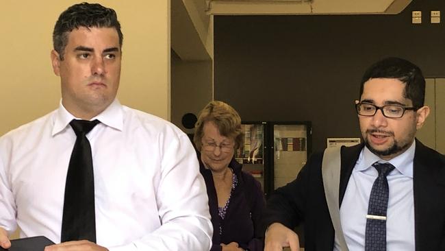 Masseuse Benjamin Steed (left) leaves Parramatta Local Court with his mum and lawyer Fahim Khan after he was sentenced for sexually touching a client.