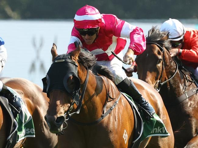 SYDNEY, AUSTRALIA - DECEMBER 21:  Jay Ford riding Ang Pow wins Race 8 James Squire during Sydney Racing at Royal Randwick Racecourse on December 21, 2024 in Sydney, Australia. (Photo by Jeremy Ng/Getty Images)