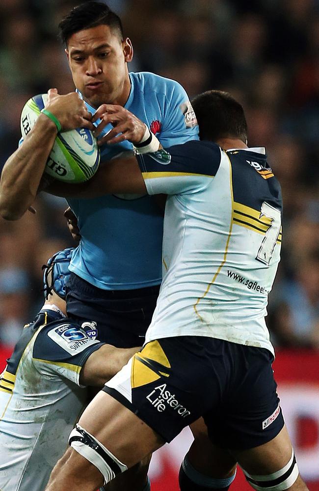 Israel Folau charges ahead for the Waratahs.