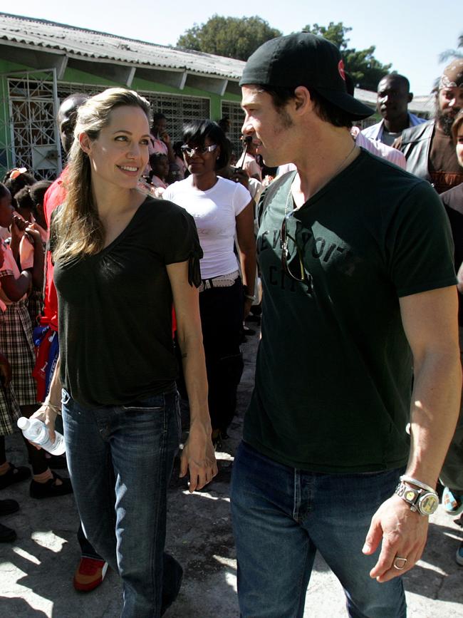 2006: Angelina Jolie and Brad Pitt tour the Immaculate Conception School, in Port au Prince, Haiti. Picture: AP