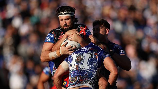 SYDNEY, AUSTRALIA – MAY 29: Aaron Woods of the Dragons is tackled during the round 12 NRL match between the Canterbury Bulldogs and the St George Illawarra Dragons at Belmore Sports Ground, on May 29, 2022, in Sydney, Australia. (Photo by Cameron Spencer/Getty Images)