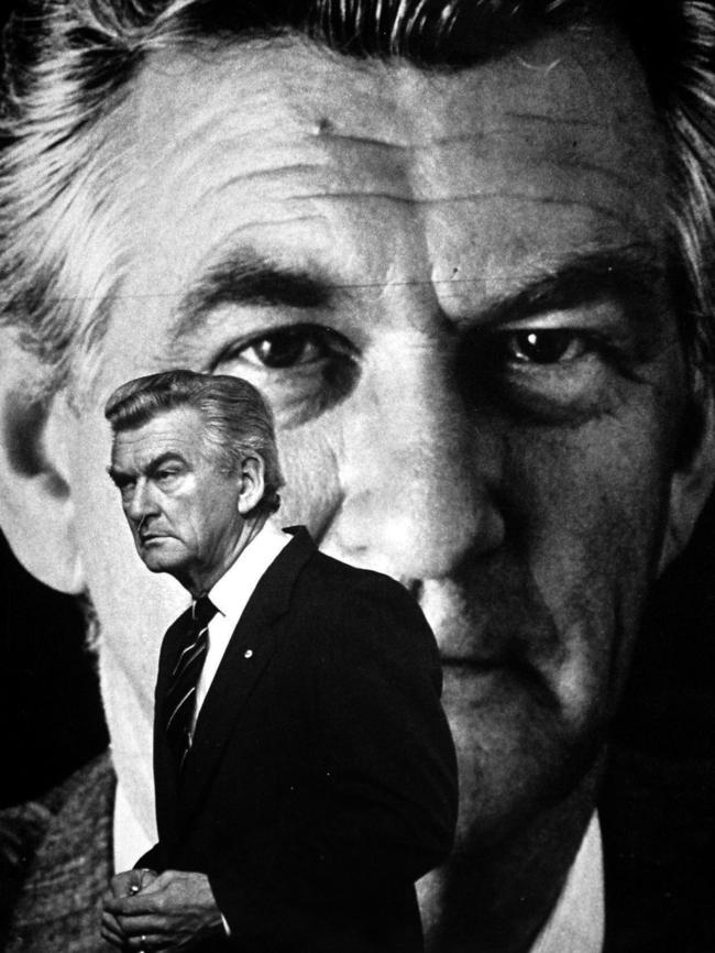 Then Prime Minister Bob Hawke walks past his portrait at the Australian Labor Party national conference in 1986.