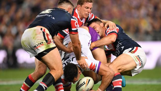 Storm big man Nelson Asofa-Solomona couldn’t get through Cooper Cronk and his Roosters teammates. Picture: AAP