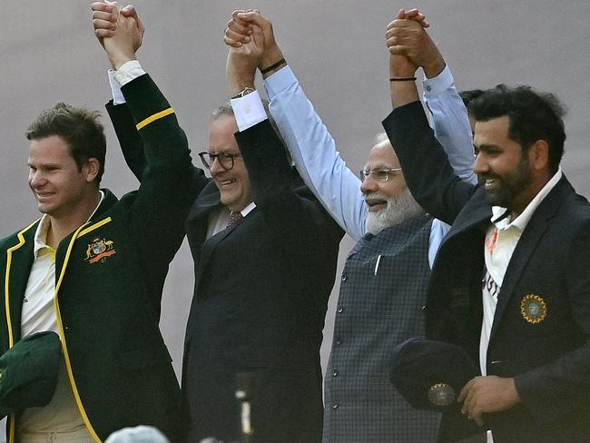 Mr Albanese and Mr Modi posing with Steven Smith Rohit Sharma. Picture: AFP