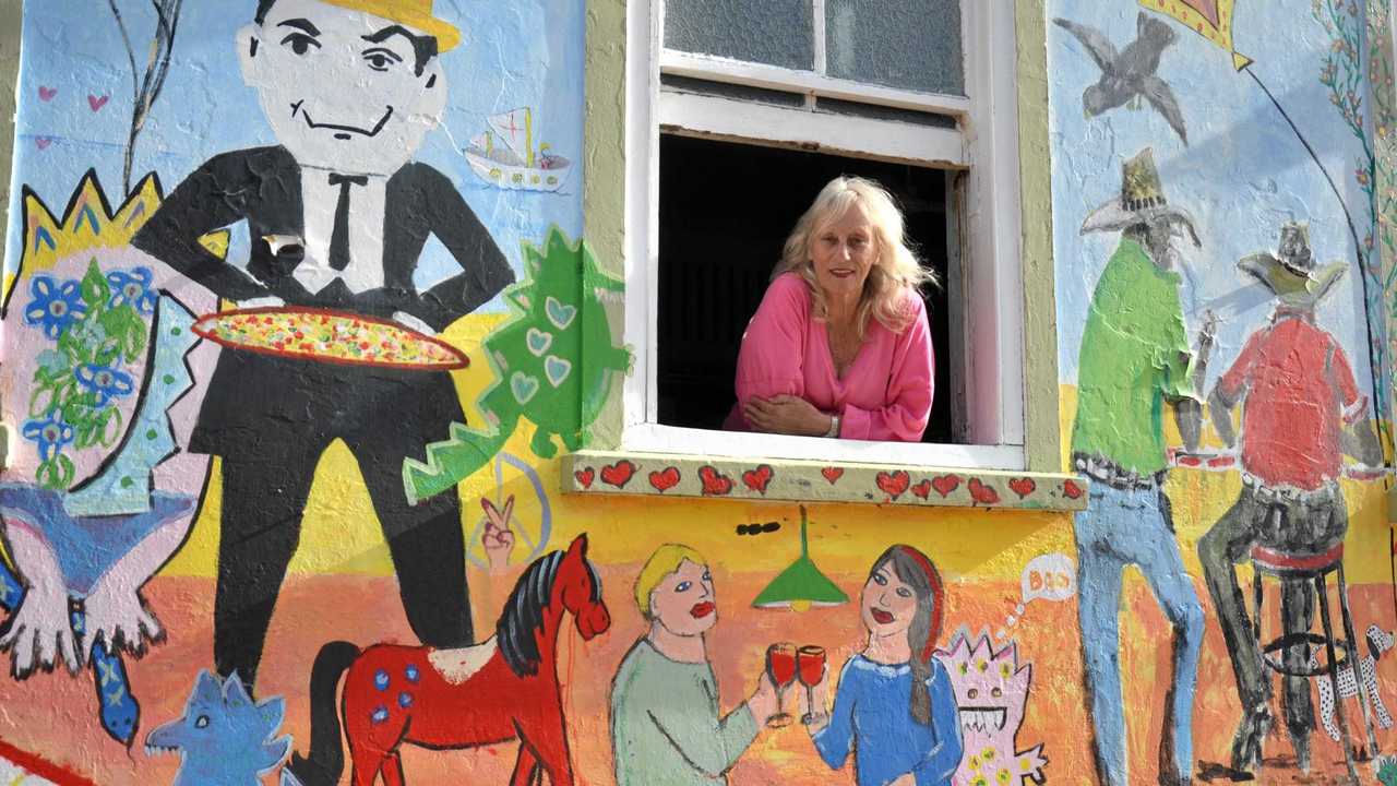 COLOURFUL PUB: Julie South at the Mulgildie Hotel, which is much more vibrant than when she first purchased it. Picture: Mackenzie Colahan