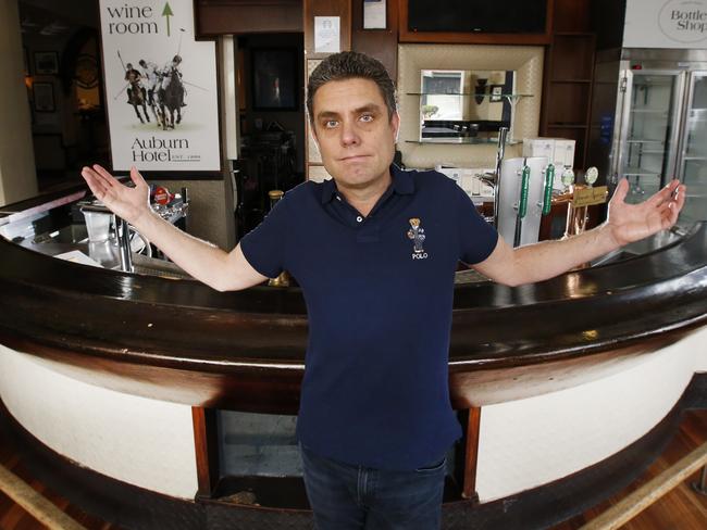 The pressure pubs are under and how little revenue they will make under the proposed guidelines and restrictions. Paul Waterson, CEO of Australian Venue Co and owner of the Auburn Hotel in Hawthorn at his empty pub.   Picture: David Caird