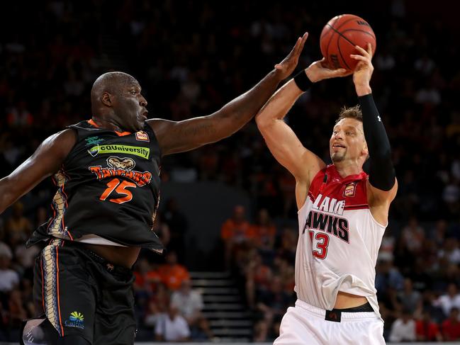 Taipans Nathan Jawai tries to block Hawks David Andersen during the Round 6 NBL match in 2019.