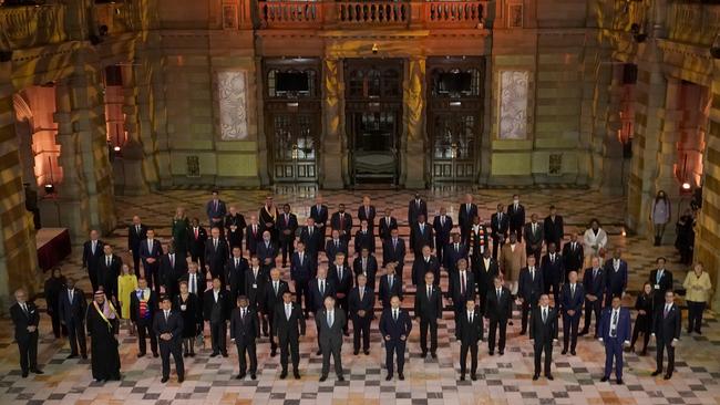 World leaders pose for a group photo during an evening reception to mark the opening day of the COP26 summit in Glasgow. Picture: Getty Images