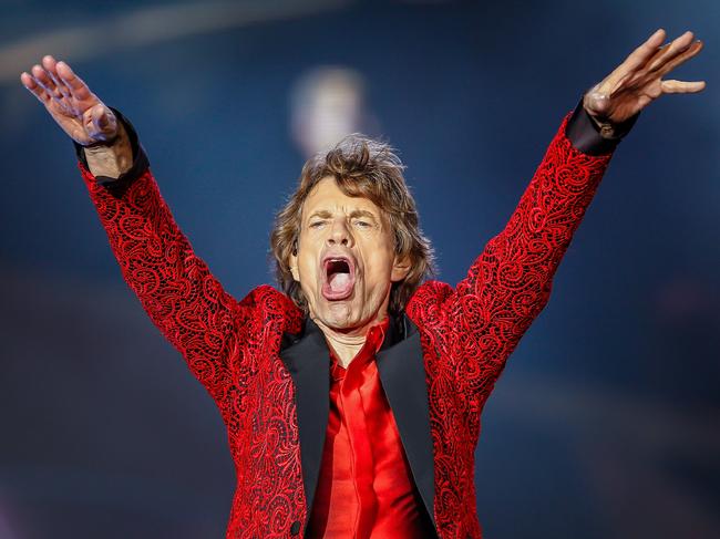 (FILES) In this file photo taken on July 03, 2015, Mick Jagger of the Rolling Stones performs at the Indianapolis Motor Speedway in Indianapolis, Indiana. - Mick Jagger is "on the mend" after a reportedly successful heart valve procedure in New York, the Rolling Stones frontman said Friday, April 5, 2019. "Thank you everyone for all your messages of support, I'm feeling much better now and on the mend - and also a huge thank you to all the hospital staff for doing a superb job," said Jagger, 75. Industry tracker Billboard had earlier said doctors performed a minimally invasive transcatheter aortic valve replacement. (Photo by Michael Hickey / GETTY IMAGES NORTH AMERICA / AFP)