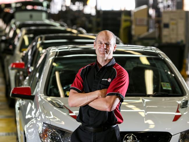 <s1>DRIVEN HOME: Michael Hatchard, who has worked at Holden for 28 years, with some of the last cars to roll off the line at Elizabeth.</s1>                        <s1> Picture:<b/></s1>Russell Millard